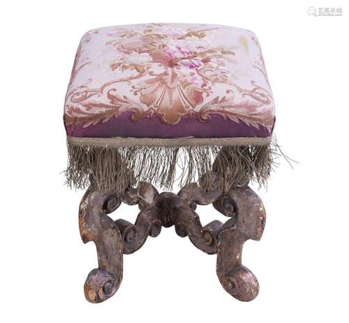 A WILLIAM AND MARY CARVED AND SILVERED PINE STOOL CIRCA 1690