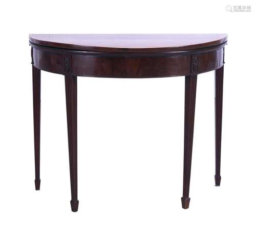 A GEORGE III MAHOGANY GAMES TABLE EARLY 19TH CENTURY