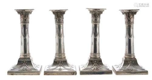 A SET OF FOUR EDWARDIAN STERLING SILVER CANDLESTICKS BY MAPP...
