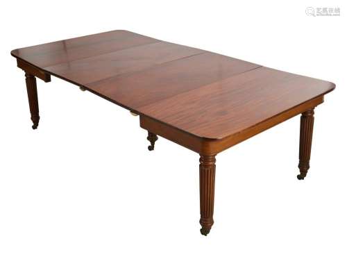 A GEORGE IV MAHOGANY EXTENDING DINING TABLE LATE 1820S