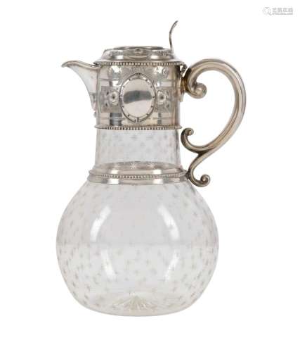 A STERLING SILVER TOPPED CRYSTAL CLARET JUG BY WILLIAM AND G...