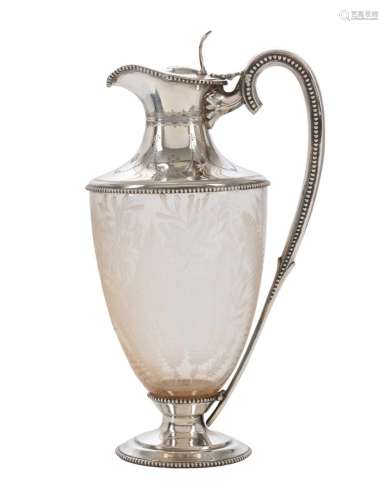A STERLING SILVER MOUNTED CRYSTAL CLARET JUG BY WILLIAM AND ...