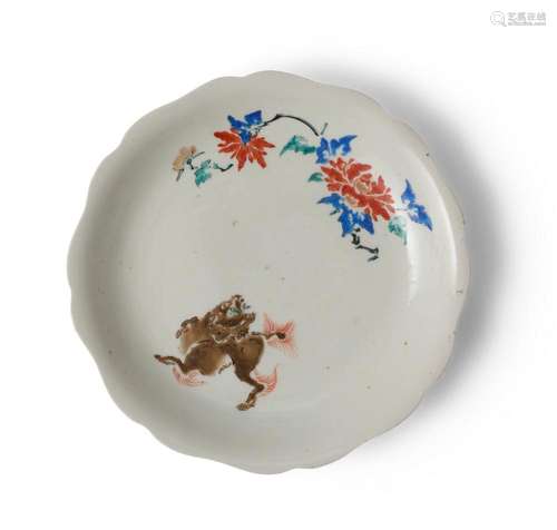 A JAPANESE KAKIEMON STYLE 'SHISHI AND PEONY' DISH ED...