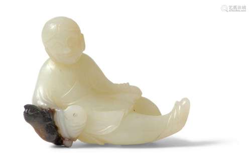 A CHINESE WHITE AND BLACK JADE FIGURE OF LIU HAICHAN QING DY...