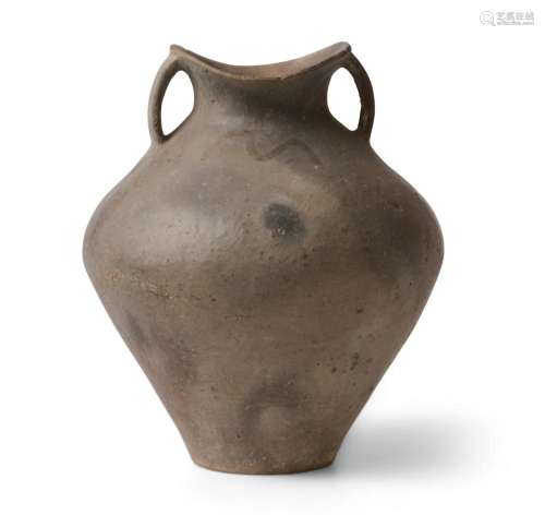 A CHINESE POTTERY TWO-HANDLED JAR SIWA CULTURE (14TH-11TH CE...