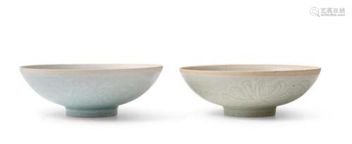 A PAIR OF CHINESE QINGBAI BOWLS WITH CARVED LOTUS DECORATION...