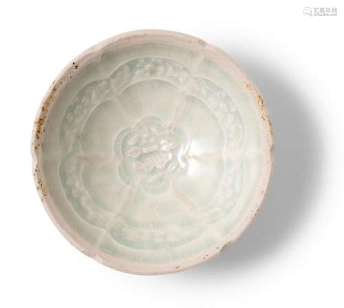 A CHINESE QINGBAI MOULDED FOLIATE-RIM CUP SONG DYNASTY (960-...