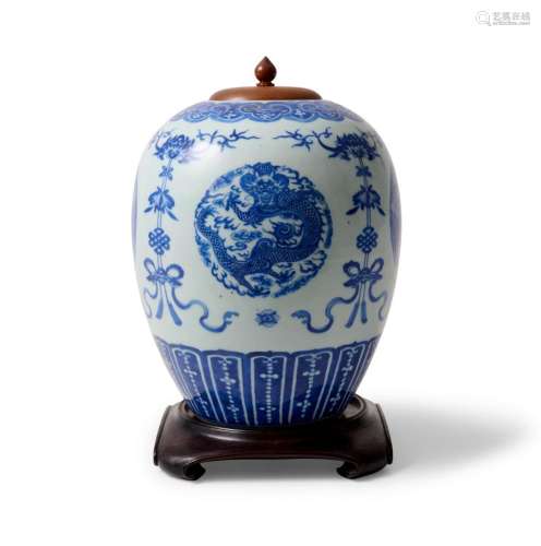 A CHINESE BLUE AND WHITE DRAGON AND PHOENIX JAR QING DYNASTY...