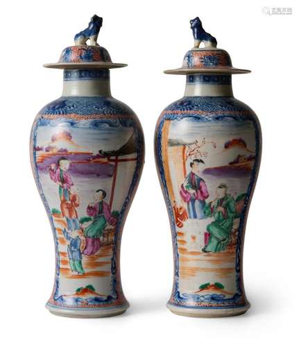 A PAIR OF CHINESE EXPORT FAMILLE ROSE COVERED VASES QIANLONG...