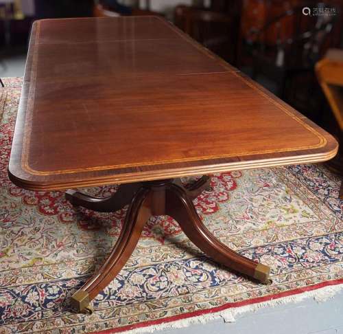 REGENCY STYLE MAHOGANY AND INLAID DINING TABLE