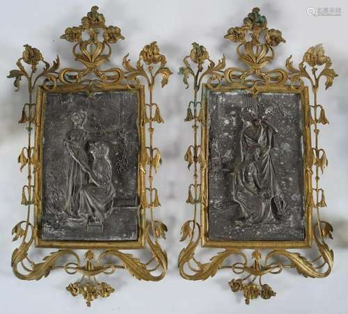 PAIR OF EARLY 20TH-CENTURY PEWTER WALL PLAQUES