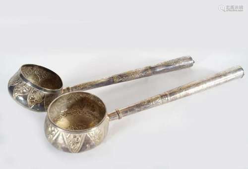PAIR OF INDIAN SILVER CEREMONIAL LADLES