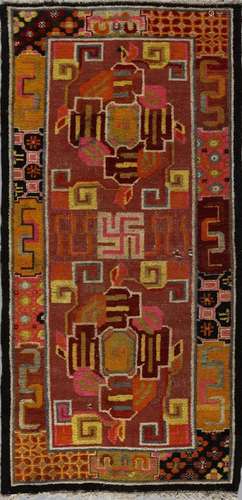 . A lively colored Tibetan rug1920-1930.