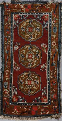 . A floral decorated rug Tibet, 19th century .