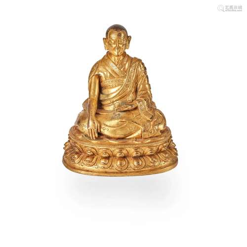 GILT-BRONZE FIGURE OF A LAMA