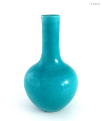 A Chinese blue monochrome baluster vase,