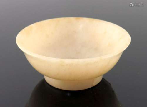 A Chinese pale jade small bowl, gently e
