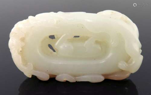 A Chinese pale jade carving, reticulated