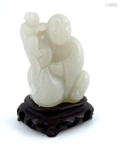A Chinese pale jade carving, in the form