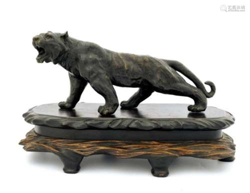 A Japanese bronze study of a prowling ti