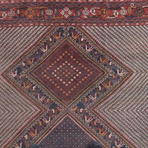 A Persian Khamseh rug, 143 by 193cm