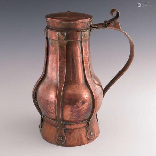 A large 19th century copper lidded flago