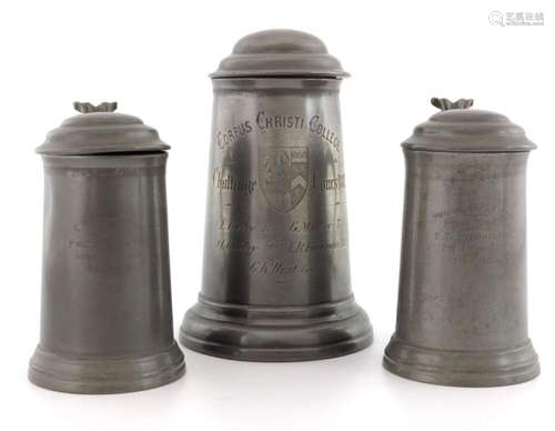 A group of three pewter sporting trophie