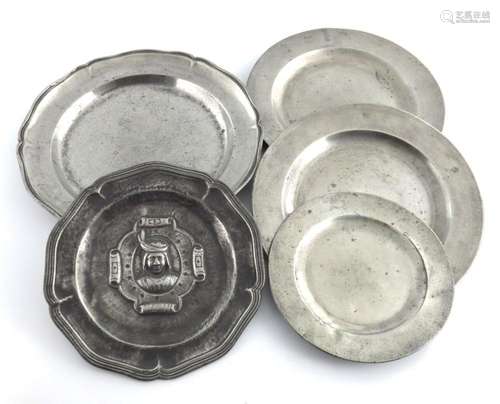 A collection of five pewter plates, incl