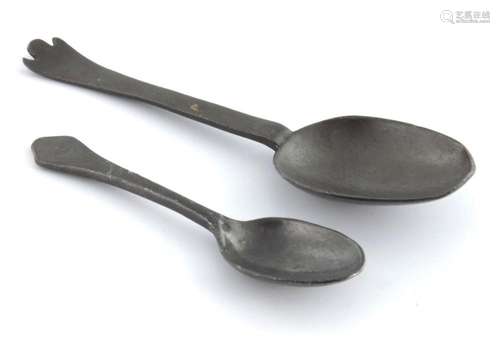 Two pewter spoons, trifid spoon and dog