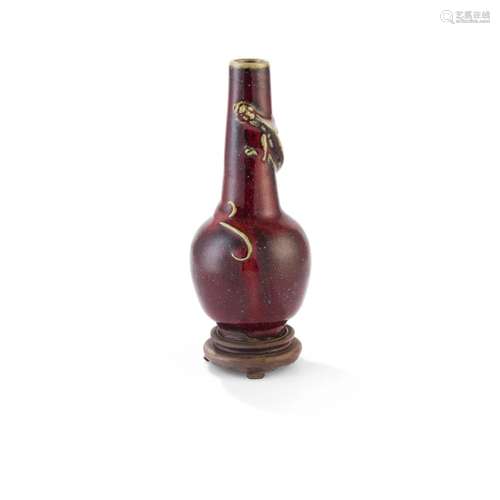 RED-GLAZED MOULDED BOTTLE VASE QING DYNASTY, 19TH