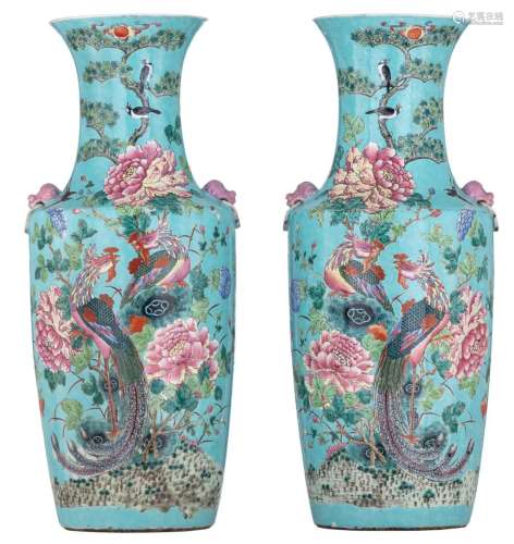 A fine pair of famille rose on turquoise ground vases, paire...