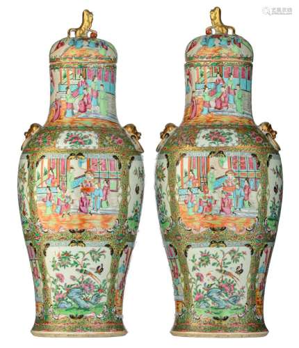 A near pair of Chinese Canton famille rose covered vases, wi...