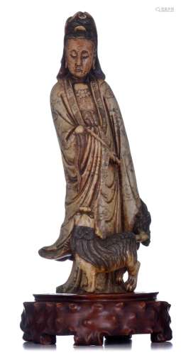 A Chinese soapstone figure of a standing Guanyin, early 19th...