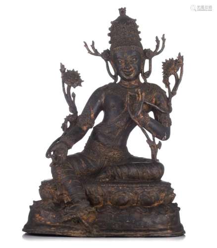 A Sino-Tibetan/Nepalese gilt-bronze figure of Green Tara, 18...