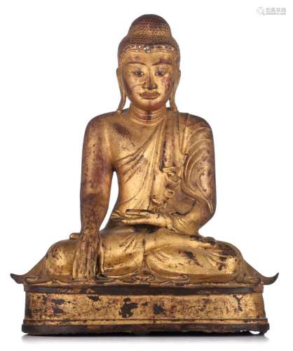 A Burmese Mandalay gilt-bronze seated Buddha, 19thC, H 48,5 ...