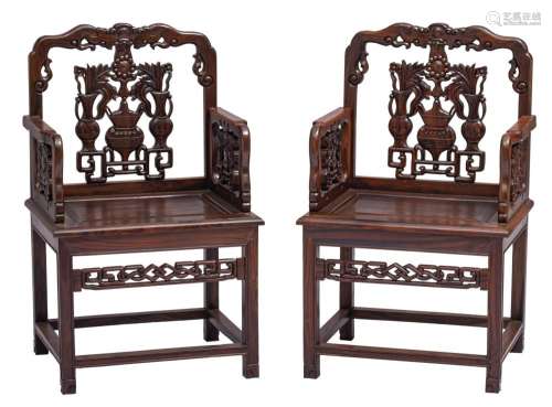 A pair of Chinese carved hardwood armchairs, H 98,5 - W 60,5...