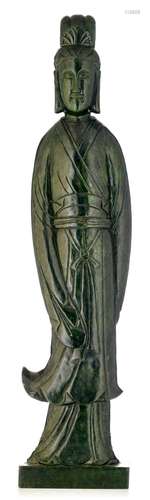 A Chinese dark green jadeite sculpture of a female servant, ...