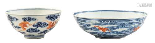 Two fine Chinese blue and white and iron red bowls, both mar...