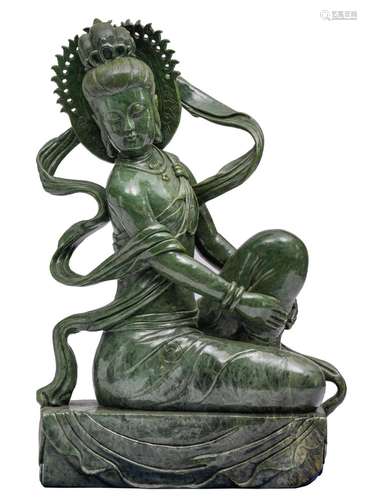 A Chinese dark green jadeite sculpture of a female Immortal,...