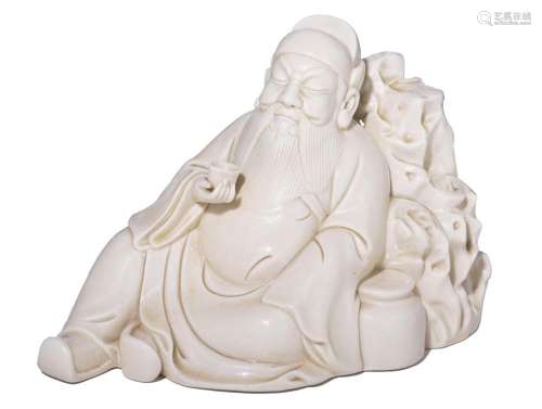 A Chinese Dehua blanc-de-Chine figure of Zhong Kui, with an ...