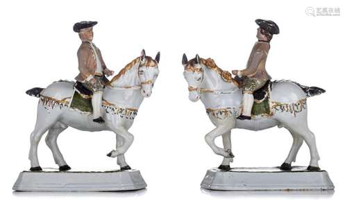 A pair of Dutch Delft cold-painted models of prancing Lipizz...