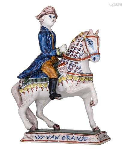 A Dutch Delft polychrome figure of a Willem of Oranje on hor...