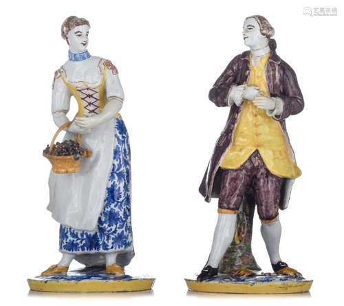 A pair of Dutch Delft figures of a gallant couple, 18thC, H ...