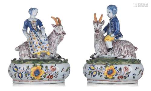 A very fine pair of Dutch Delft butter tubs, with figural co...