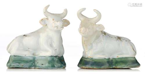 A rare pair of white Delft figures of cows, 18thC, marked Ge...