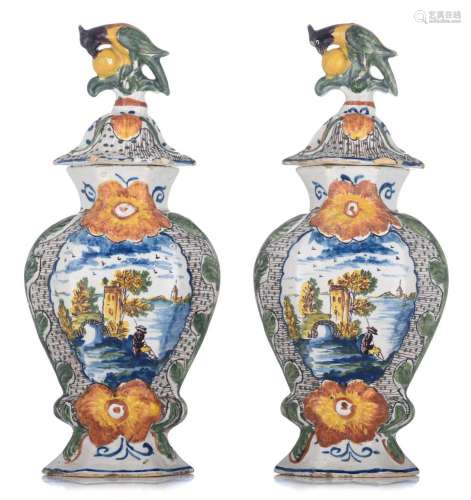 A pair of Delft Rococo vases and covers, marked 'De Drie...