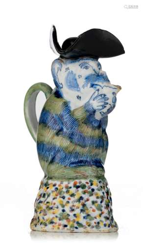 An exceptional Dutch Delft polychrome monkey-shaped milk jug...