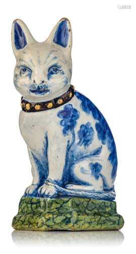 A rare Delft figure of a sitting cat, marked Johannes van Du...