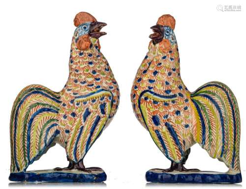 A pair of Dutch Delft polychrome figures of cockerels, late ...