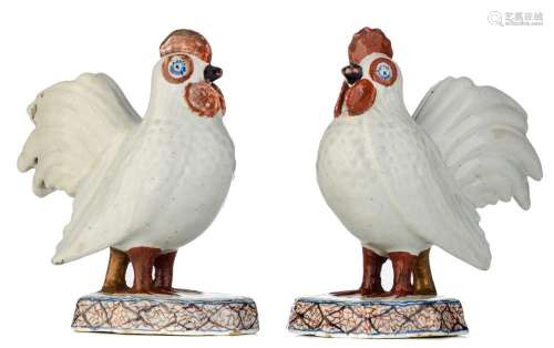 A charming pair of Dutch Delft polychrome figures of chicken...
